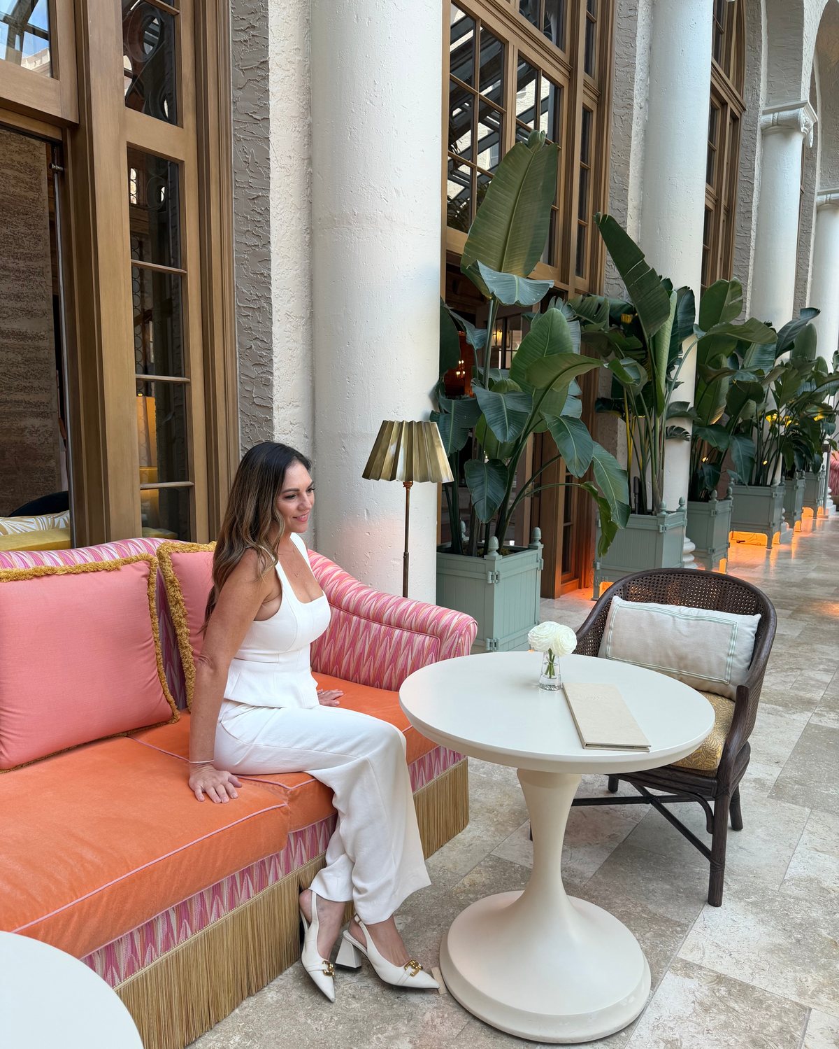Lauren Harris of Modern Membership on a waterfront terrace